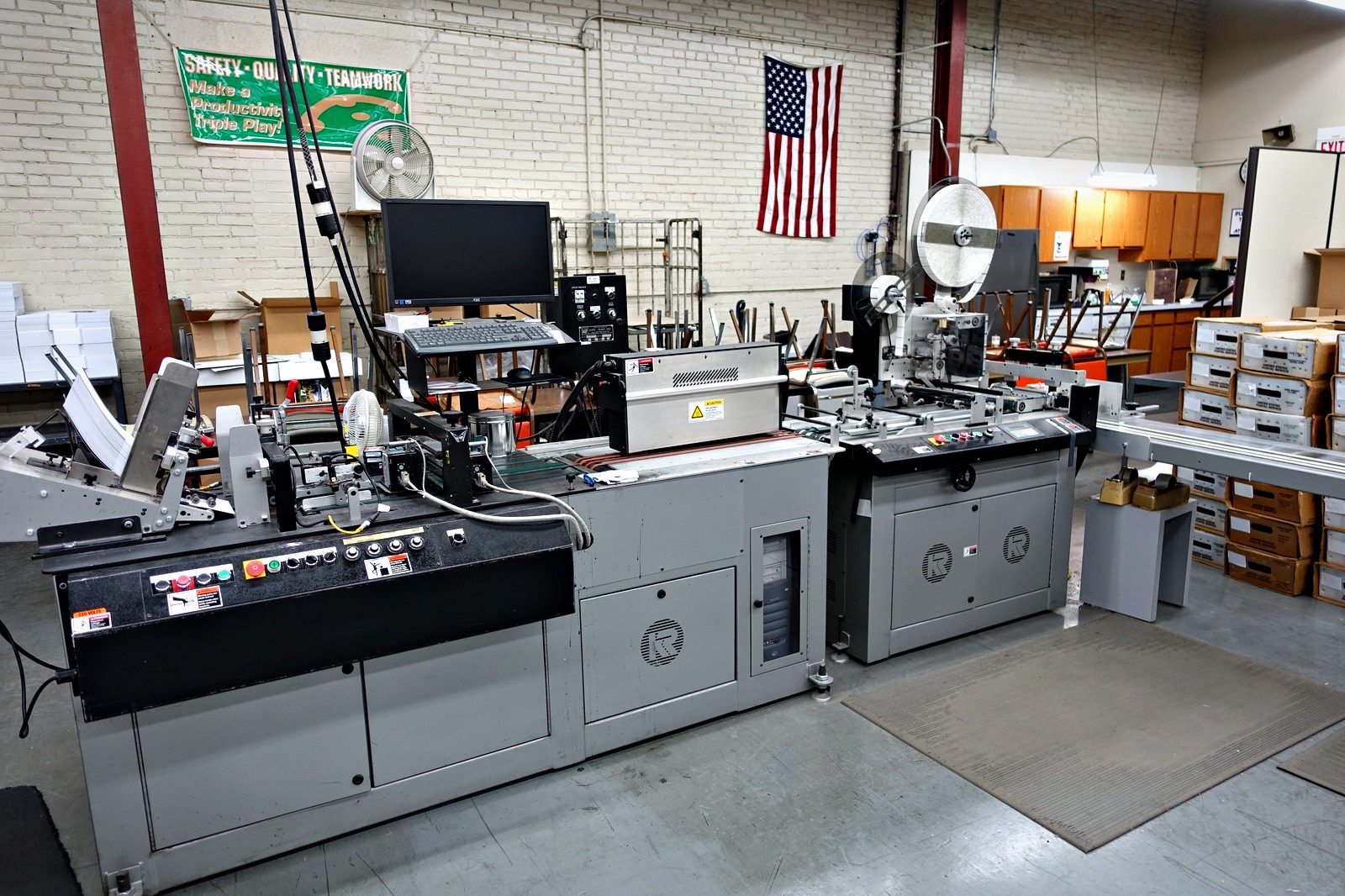 The mailing line at Broudy Printing, addressing a job