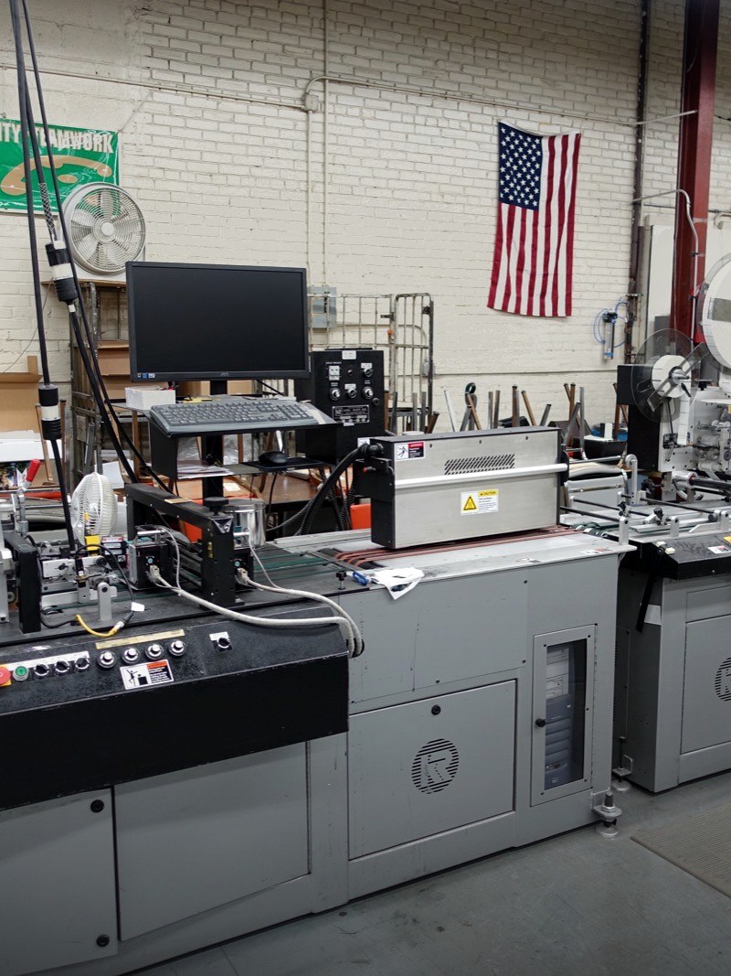 The inserting and addressing line running a mailing at Broudy Printing