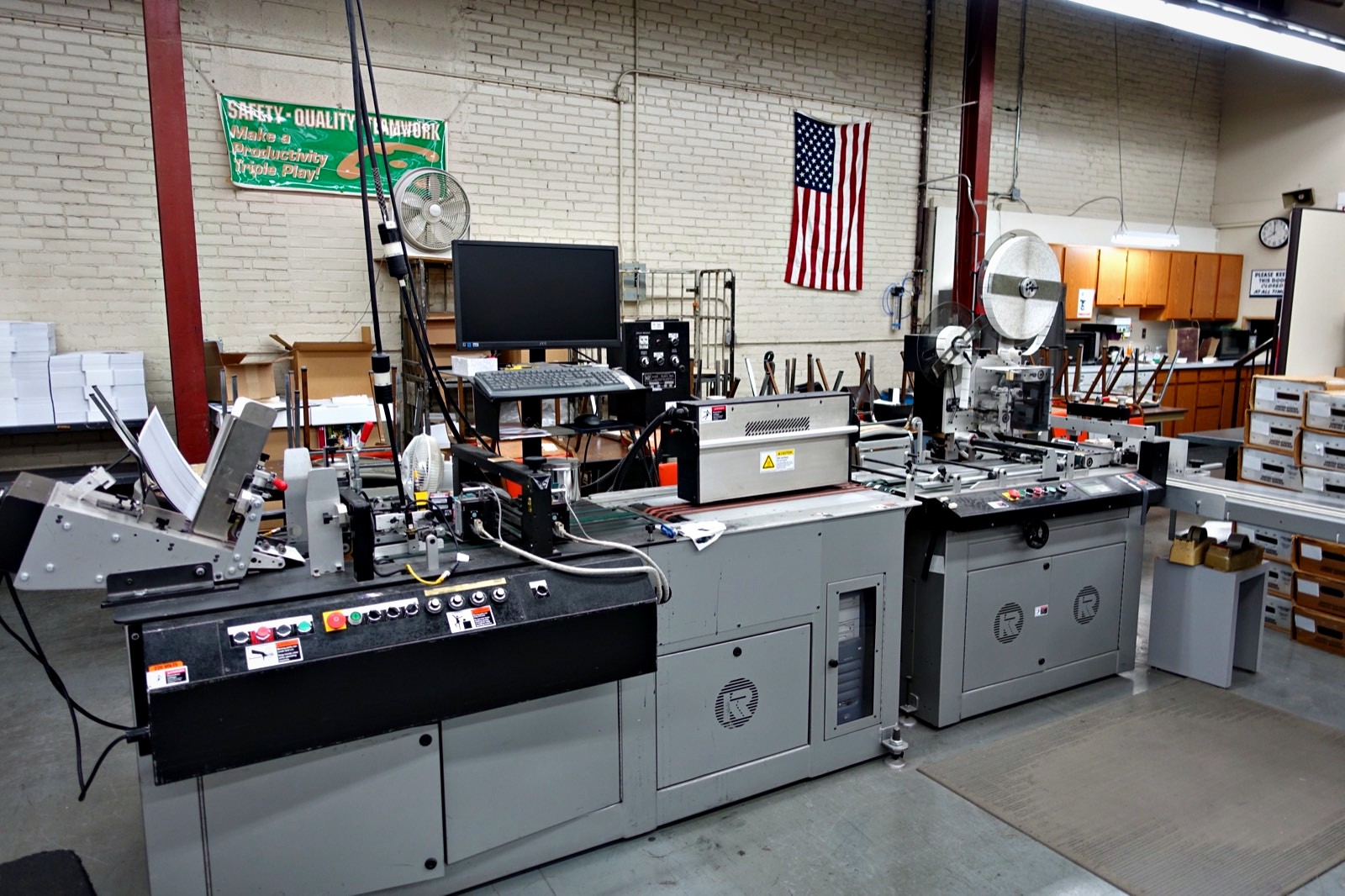 The mailing line at Broudy Printing, with inkjet addressing and inserting equipment